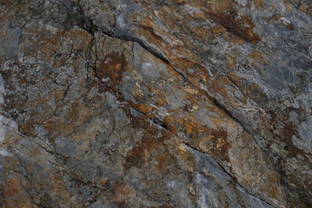 istock surfaces of rocks by the sea 2149140032