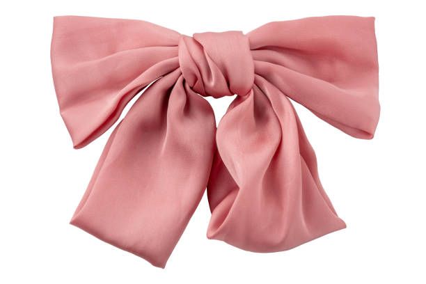 istock Pink satin ribbon bow isolated 2149140731
