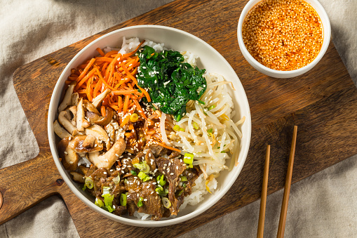 Hearty Korean Bibimbop Dish with Beef Mushrooms Carrots and Rice