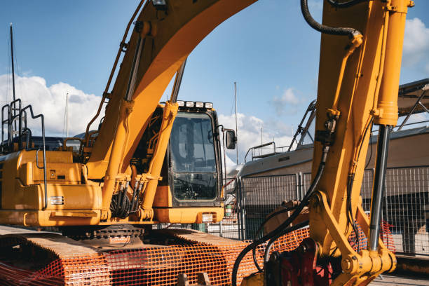 istock Construction works on the beach, huge yellow excavators 2149142734