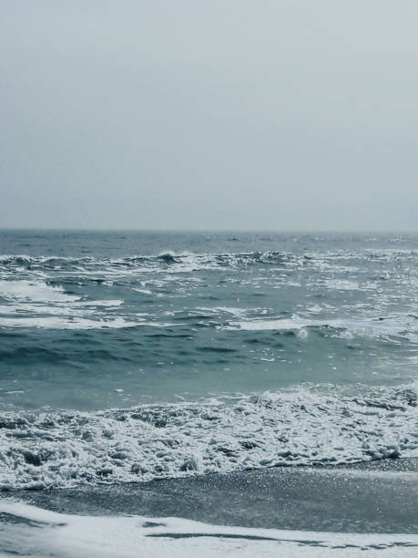 istock Sea wave surf with white foam. Seascape. Traveling wave 2149144308
