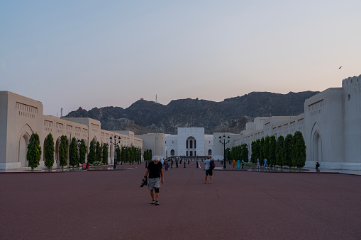 Muscat, Oman - 2. November 2023: Entrance to the Al Alam Sultan Palace at dusk, Muscat, Oman