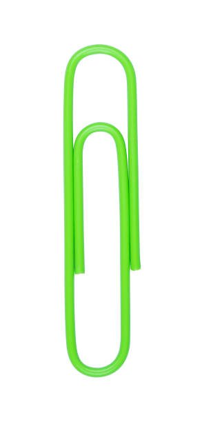 Colorful paper clip macro shot, isolated on white background