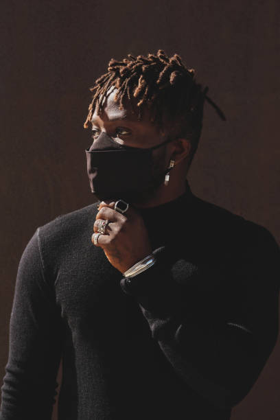istock Thoughtful African American man in black face mask 2149148694