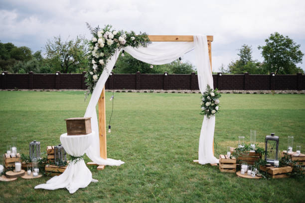istock Square arch for a wedding ceremony. beautiful flowers 2149149461