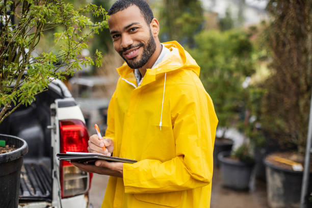 istock Smiling Black Male Gardener Taking Inventory 2149151124