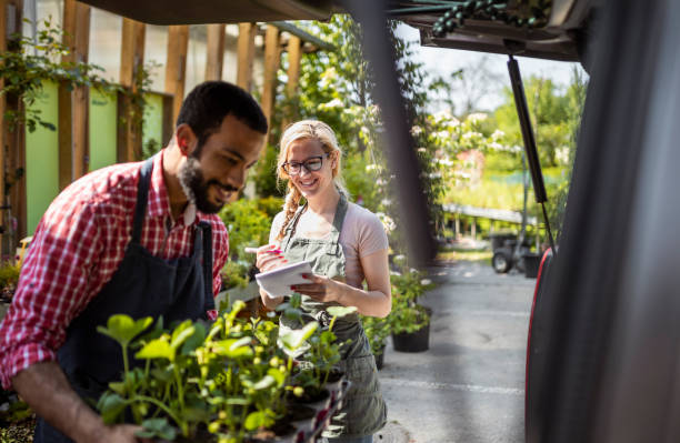 istock Diverse Gardeners Preparing Plant Delivery 2149151138