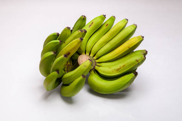 istock green banana bunch on a white background, banana for export 2149151196