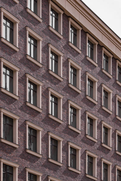 istock A new brick multi-story building with square windows 2149151305