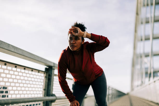 Shot of tired female runner