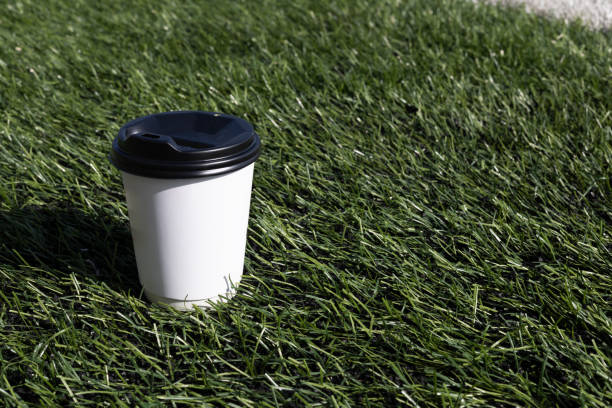 white paper cup on the football field