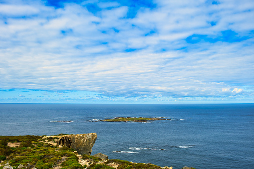 A small island in the vast expanse of the Southern Ocean off the coast of Point d’Entrecasteaux, in D’Entrecasteaux National Park, close to Windy Harbour, Western Australia