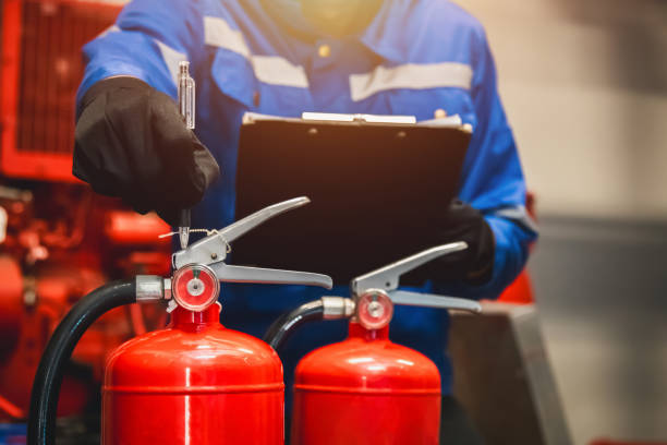 istock Engineer check fire extinguisher tank in the fire control room for safety in factory or industry. 2149163185