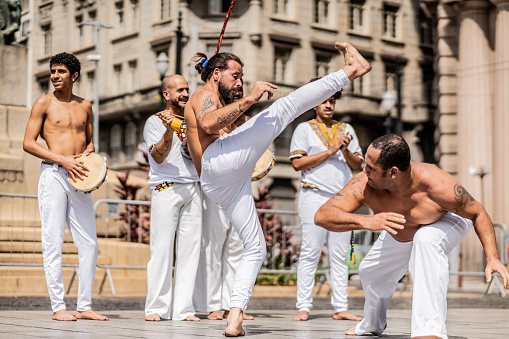 Capoeiristas playing capoeira in Sao Paulo, Brazil