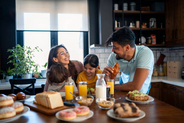 istock Proud happy parents spending quality time in the morning during weekend 2149164632