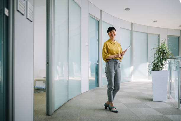 istock Stylish Asian corporate employee in office environment 2149165203