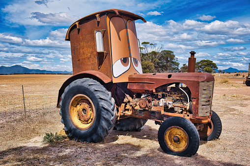 Gnownagerup, Australia, 03/13/2023. Street art tractor in the Australian outback, along the 'Horsepower Highway' art trail in Gnowangerup, Western Australia