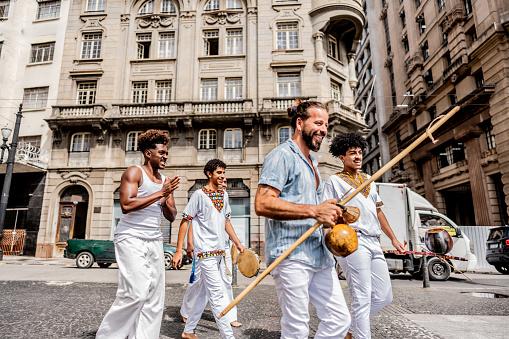 Capoeiristas walking in Sao Paulo, Brazil