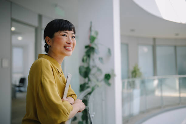 istock Asian corporate employee portrait in office environment 2149167930