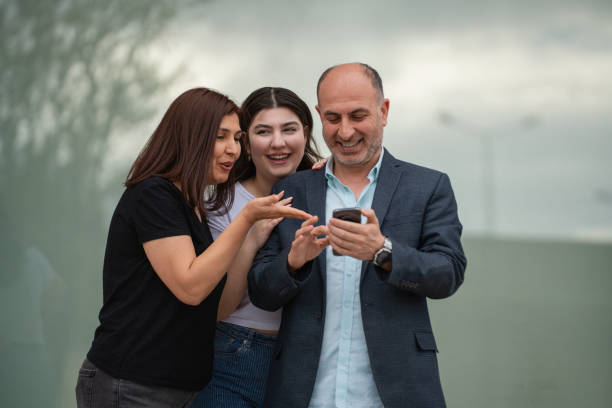 istock Family using smartphone for money transfer 2149168362