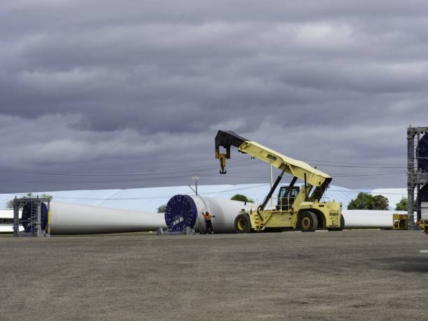istock Wind turbine parts and crane 2149169159