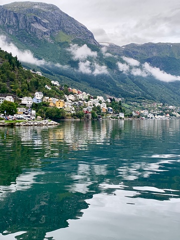 Reflection of the town of Odda in Norway