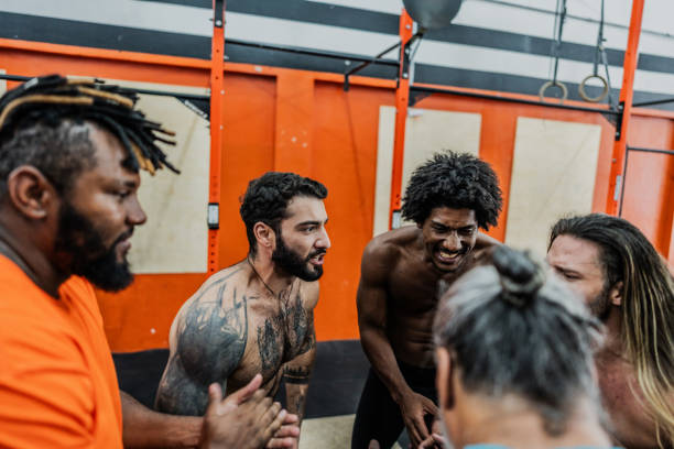 istock Men motivating themselves at the gym 2149169730