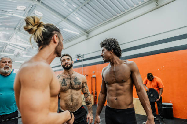 istock Young friends men talking at gym 2149170123
