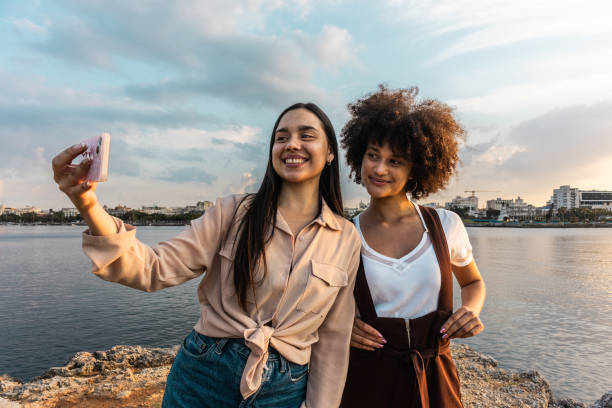 istock Young women taking a selfie outdoors 2149171366