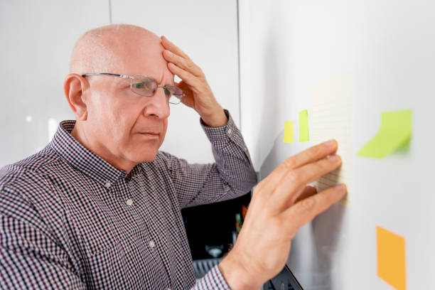istock Elderly man with dementia has trouble remembering 2149174712