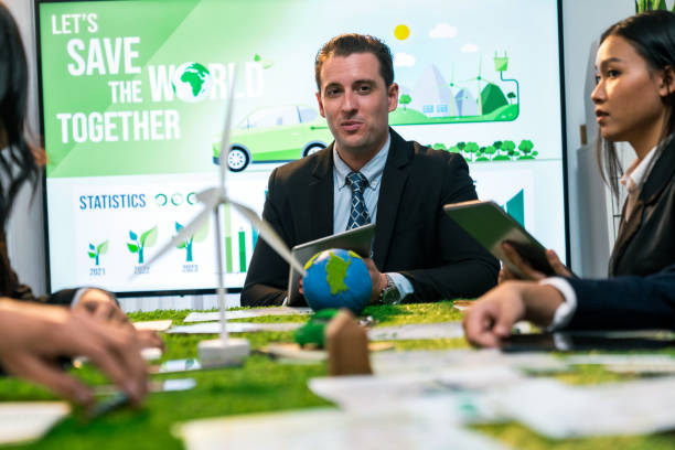 istock Diverse group of business people planning for alternative energy. Quaint 2149174832