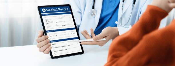 istock Laptop display medical report on blurred doctor office. Rigid 2149176610