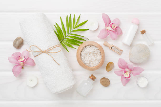 istock Composition with orchids, spa products on wooden background, top view 2149176954