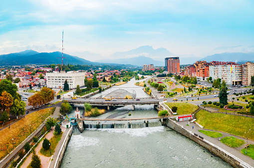 Bridge through Terek river aerial panoramic view in Vladikavkaz. Vladikavkaz is the capital city of the North Ossetia Alania Republic in Russia.
