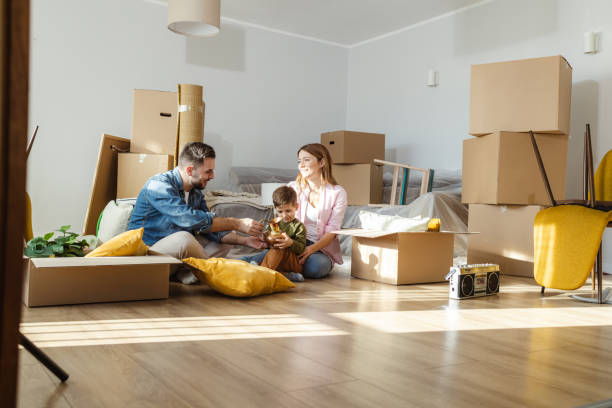 istock Happy family moving in new home 2149177152