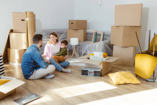 istock Happy family moving in new home 2149177639