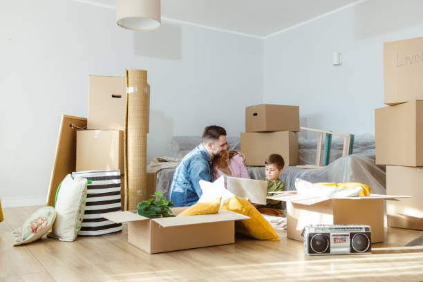 istock Happy family moving in new home 2149177640