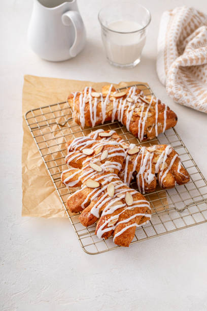 istock Bear claws pastry topped with glaze and almonds 2149179115