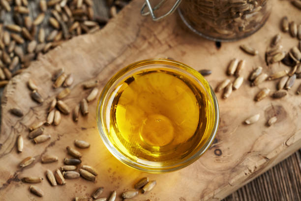 A bowl of milk thistle oil, close up