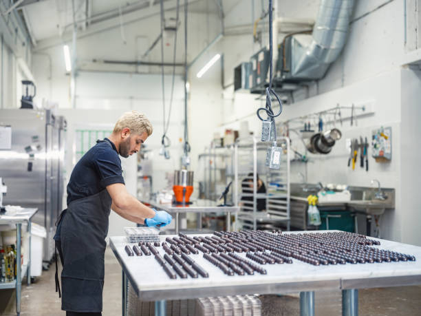 istock Indian male chocolatier working at the chocolate factory 2149180568