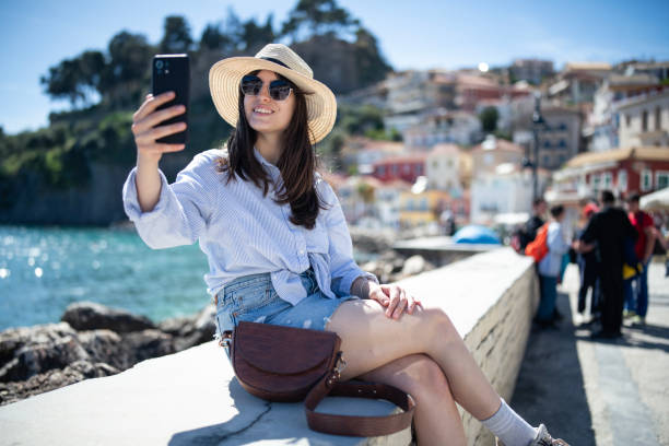 istock Young woman on vacation taking selfies. 2149181408