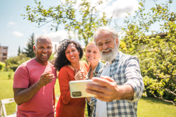 istock Seniors Taking a Selfie at the Picnic Party 2149182025