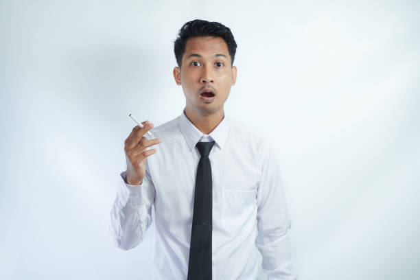 istock businessman was smoking surprised 2149185471