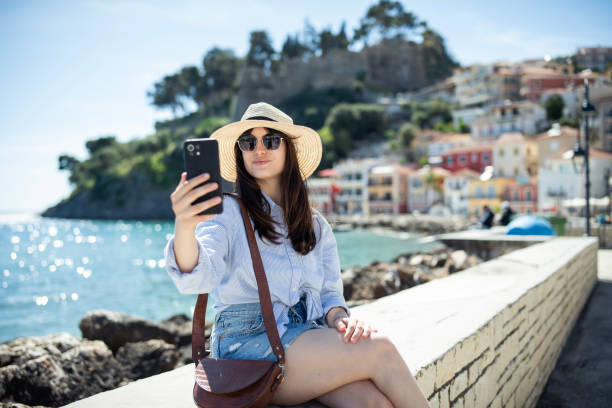 istock Young woman on vacation taking selfies. 2149188682