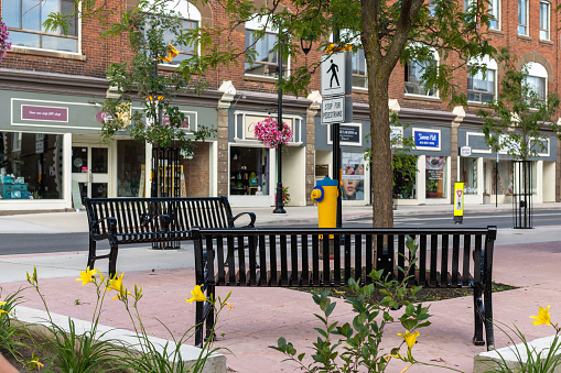 Carleton Place, Canada - August 13 2023: Benches in downtown Carleton Place, Ontario. Bridge Street