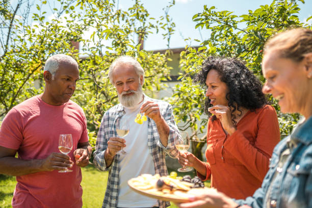 istock Cheerful Diverse Seniors Having Summer Picnic 2149189256