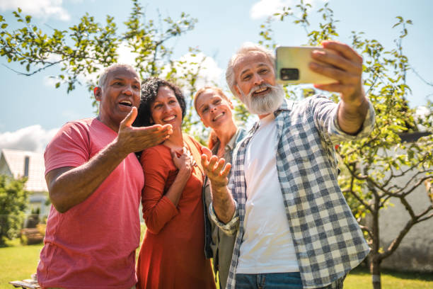 istock A Charming Man Taking a Selfie with His Senior Friends 2149189258