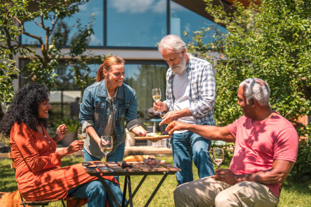 istock Picnic Bliss: Smiling Senior Friends Create Lasting Memories 2149189262