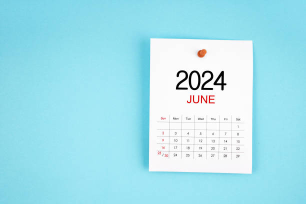 istock June 2024 calendar page with push pin on blue background. 2149193126