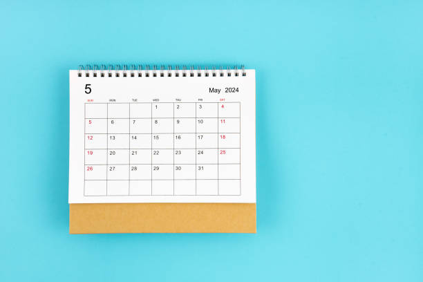 istock May 2024, Monthly desk calendar for 2024 year on blue background. 2149193127